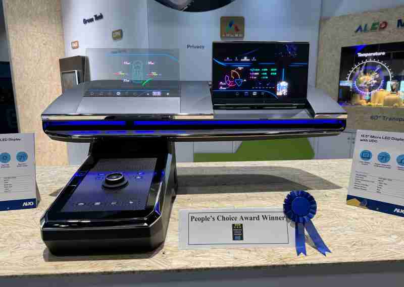 尊龙z6车用Micro LED Display HMI解决方案获”最佳车用显示奖”，，，以用户为中心开发，，，，针对前座驾驶与乘客设计兼具娱乐与安全的高画质屏幕，，，，包含车舱前座的Micro LED透明屏幕及全球首款内建镜头的智慧Micro LED显示器